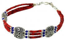 Beautiful Tibet ethnic jewelry made of small beads of coral, lapi..