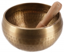 Singing bowl from Nepal, handmade from solid brass with ornaments..