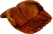 Carved hands, wooden bowl hand
